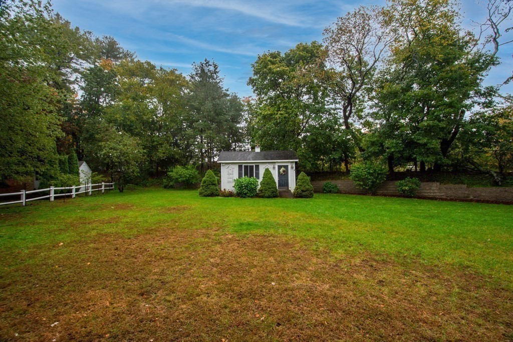 11 Milepost Road Reading, MA 01867 - Photo 28 of 29 a view of a house with a yard