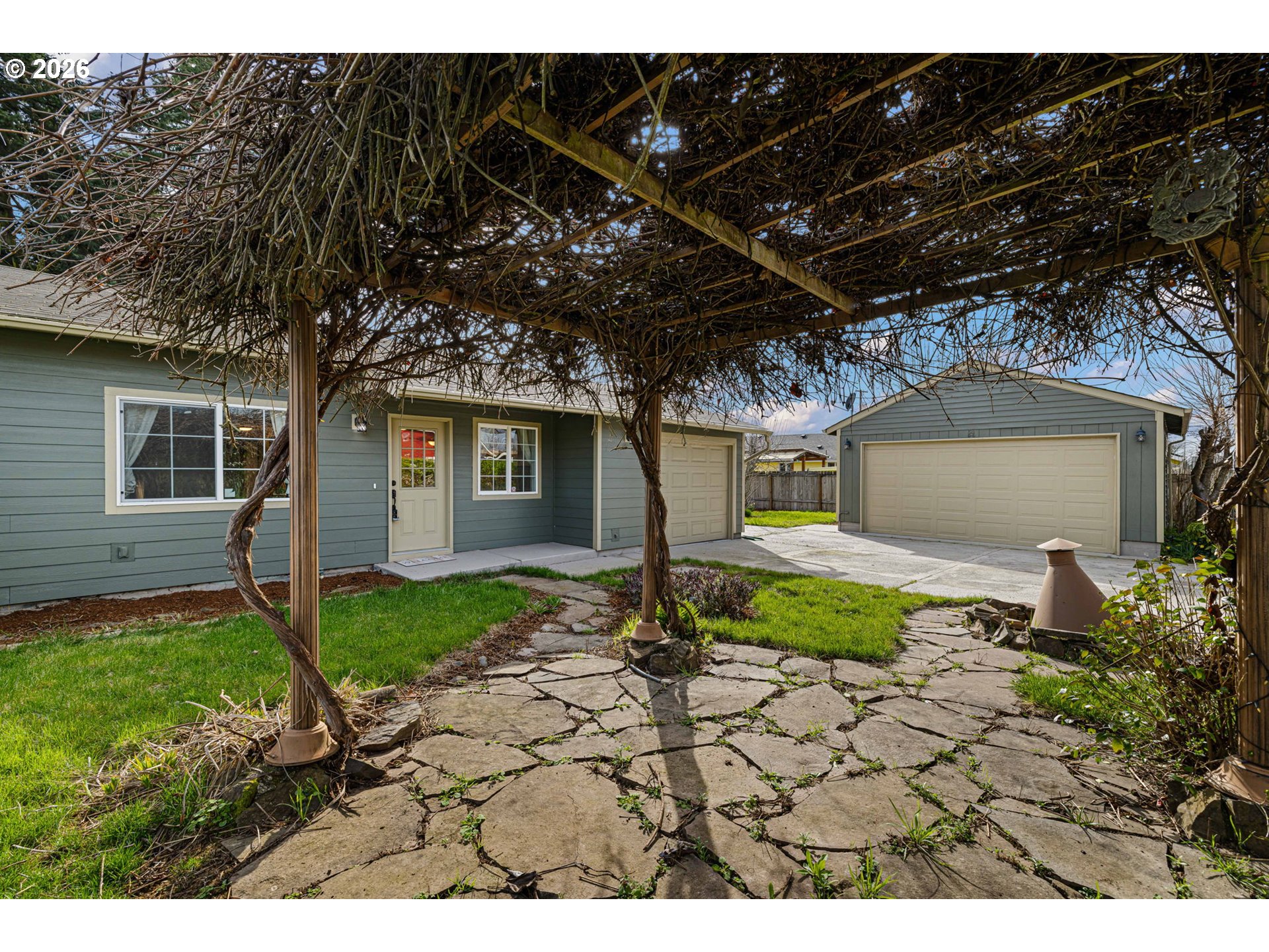 1519 Taney Street Eugene, OR 97402 - Photo 1 of 39 a backyard of a house with lots of green space