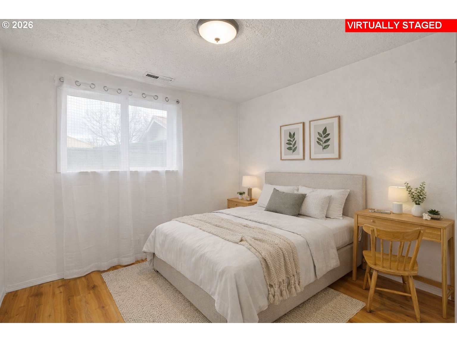 1519 Taney Street Eugene, OR 97402 - Photo 18 of 39 a bedroom with a bed and a table