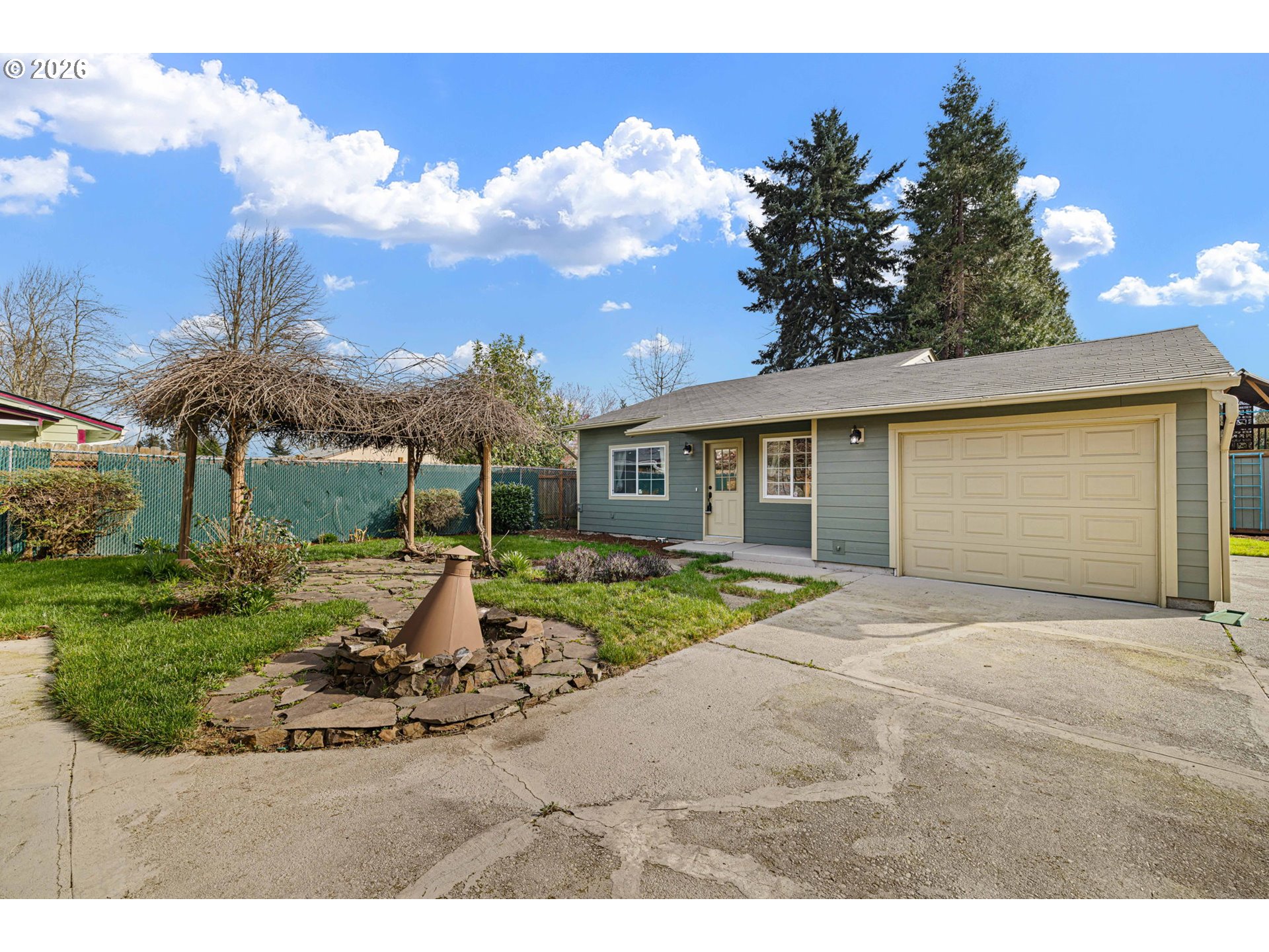 1519 Taney Street Eugene, OR 97402 - Photo 2 of 39 a front view of a house with garden