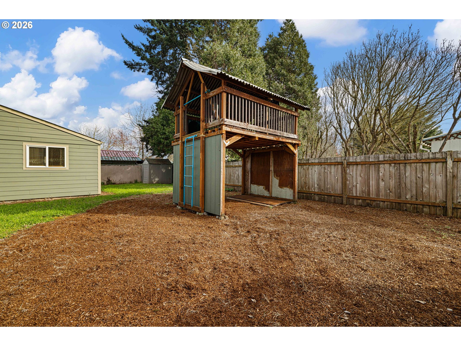 1519 Taney Street Eugene, OR 97402 - Photo 31 of 39 a view of a house with a yard