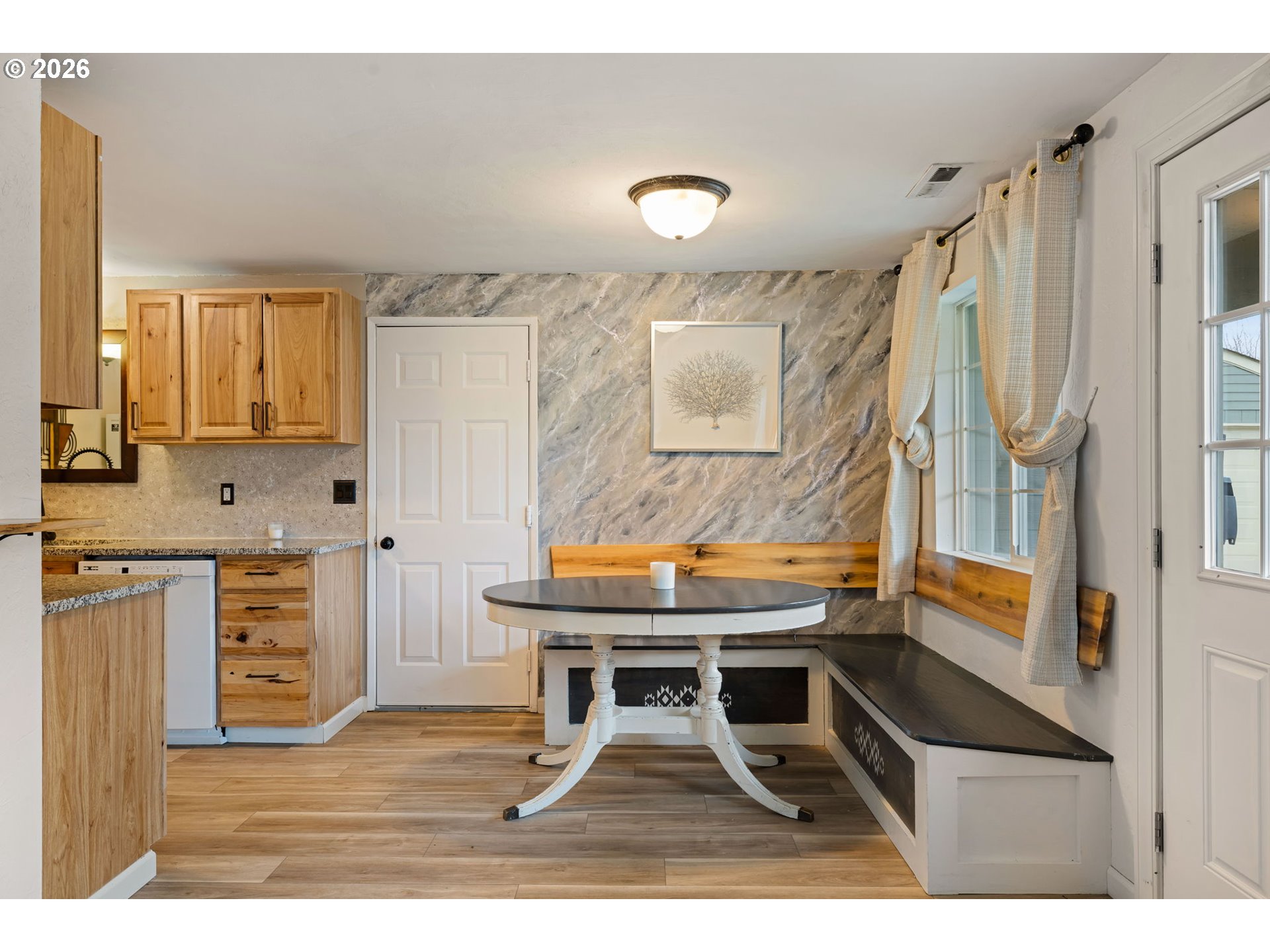 1519 Taney Street Eugene, OR 97402 - Photo 8 of 39 a room with a table chairs and a kitchen view