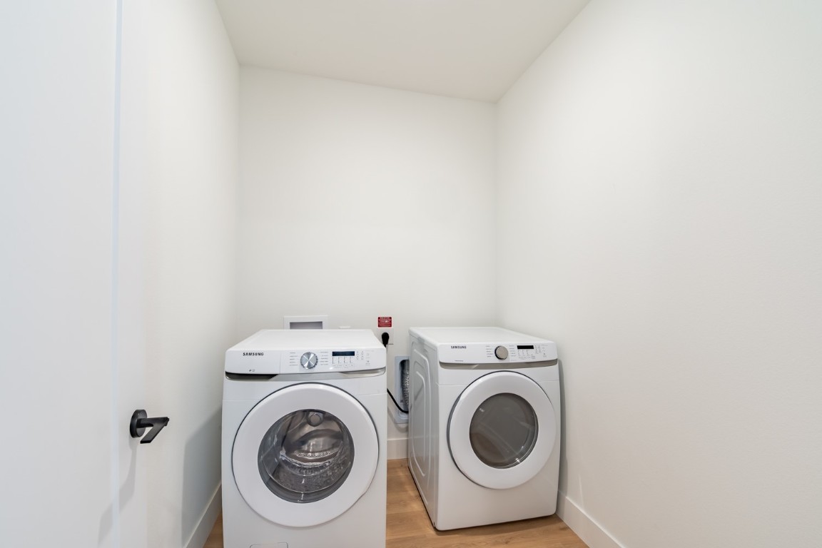 1701 Simond Avenue, Unit 611 Austin, TX 78723 - Photo 17 of 35 a utility room with dryer and washer