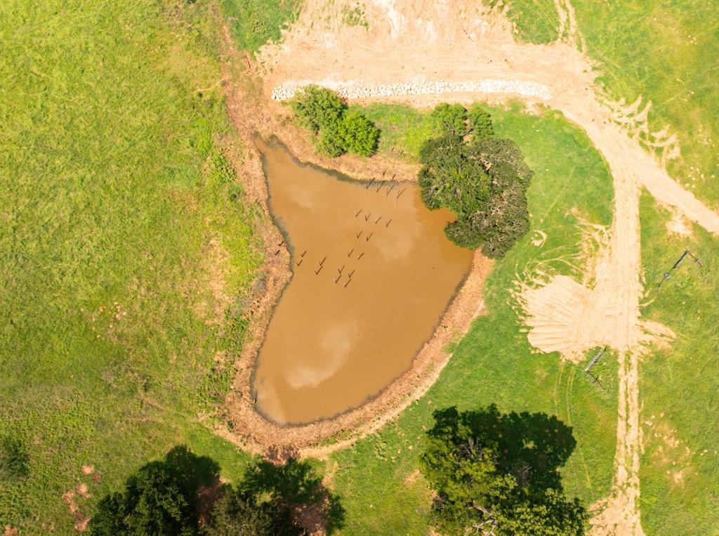 2109 River Shls Road Mineral Wells, TX 76067 - Photo 18 of 40 a view of a swimming pool from a lake view