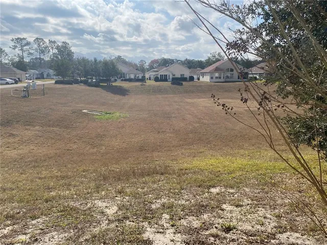 a kitchen with a refrigerator stove and microwave