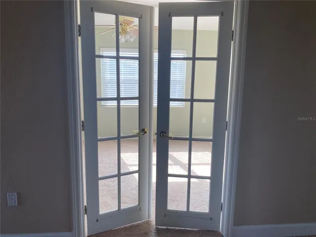 a bathroom with a toilet and a tub