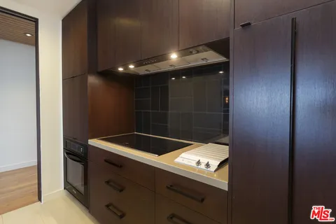 a bathroom with a light fixture and a sink