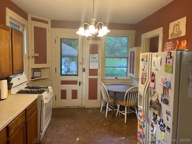 a bathroom with a sink toilet and vanity