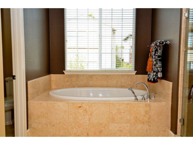 2651 Paige Way San Ramon, CA 94582 - Photo 22 of 24 a bath tub sitting in a bathroom next to a window