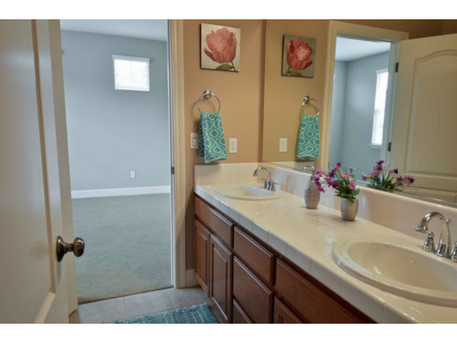 2651 Paige Way San Ramon, CA 94582 - Photo 24 of 24 a bathroom with a sink and a mirror