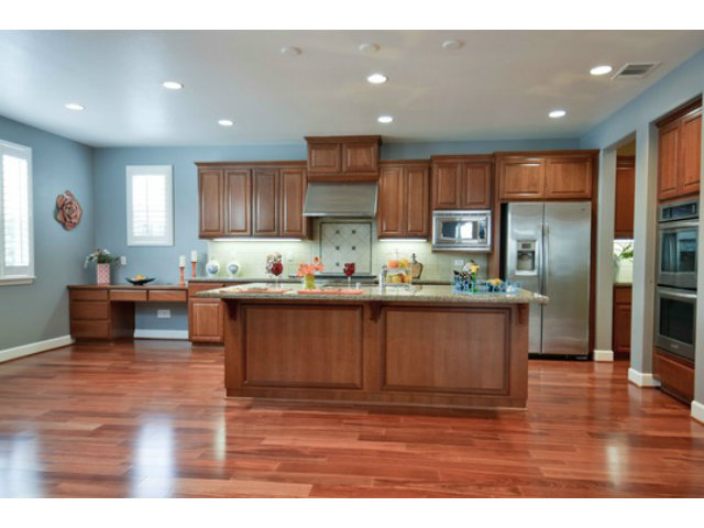 2651 Paige Way San Ramon, CA 94582 - Photo 9 of 24 a kitchen with stainless steel appliances granite countertop a refrigerator sink and cabinets