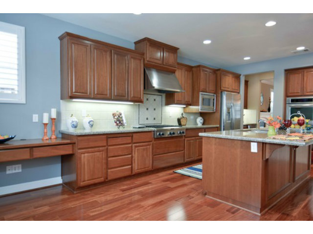 2651 Paige Way San Ramon, CA 94582 - Photo 10 of 24 a kitchen with granite countertop wooden cabinets a sink and dishwasher