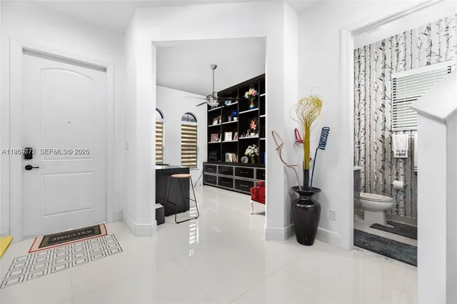 a view of water heater room with a closet