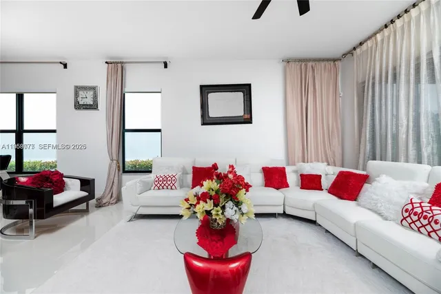 a living room with furniture and a couch