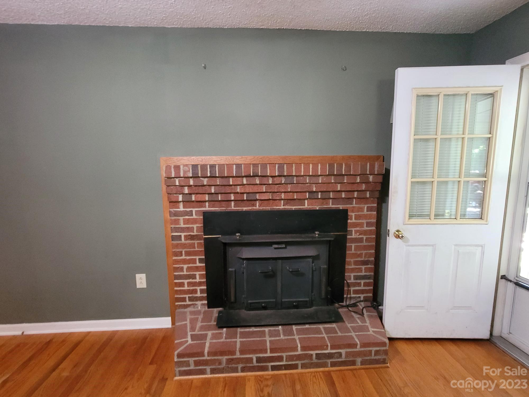 818 St Marks Church Road Bessemer City, NC 28016 - Photo 29 of 48 a living room with a fireplace