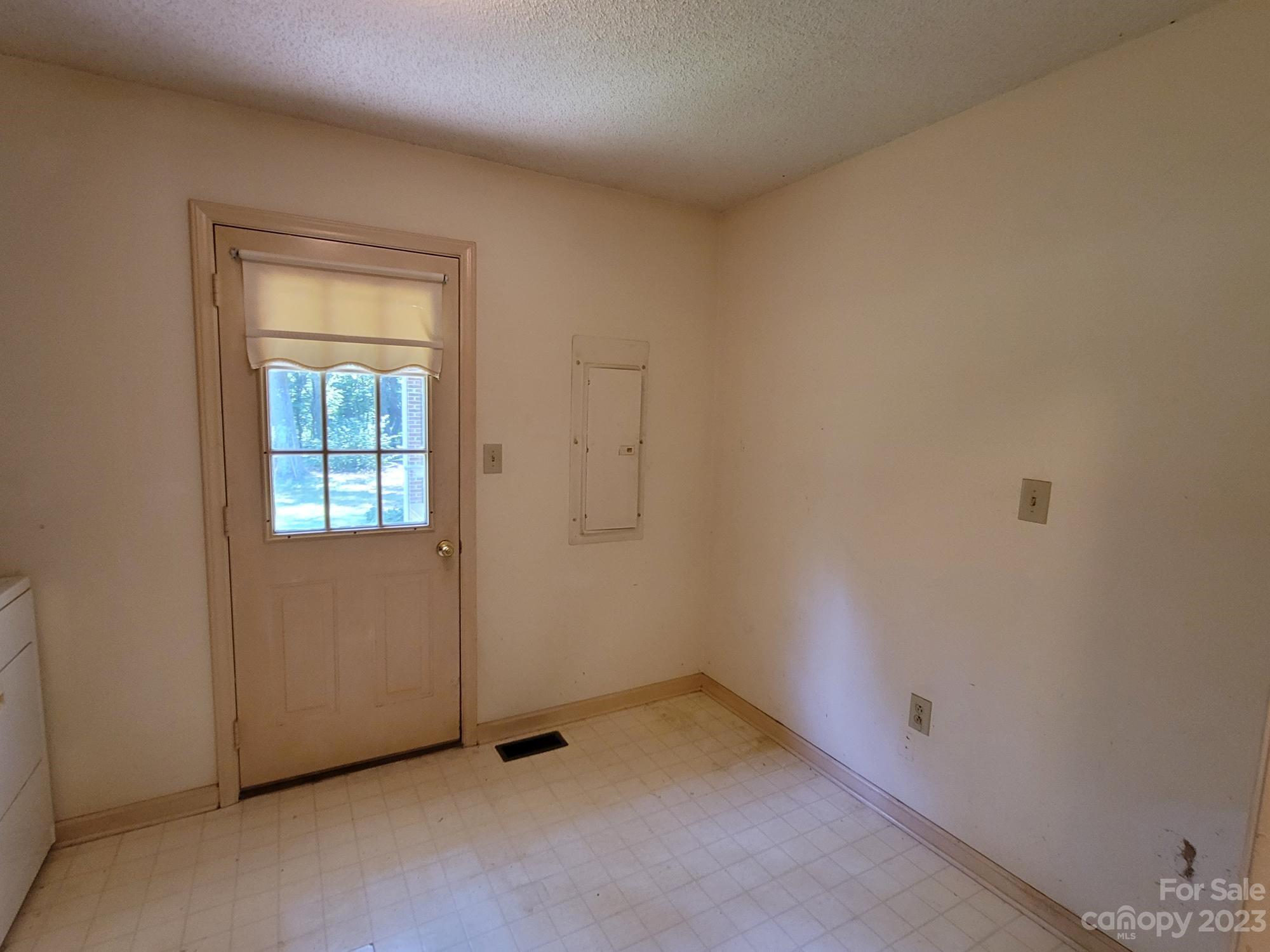 818 St Marks Church Road Bessemer City, NC 28016 - Photo 34 of 48 an empty room with windows