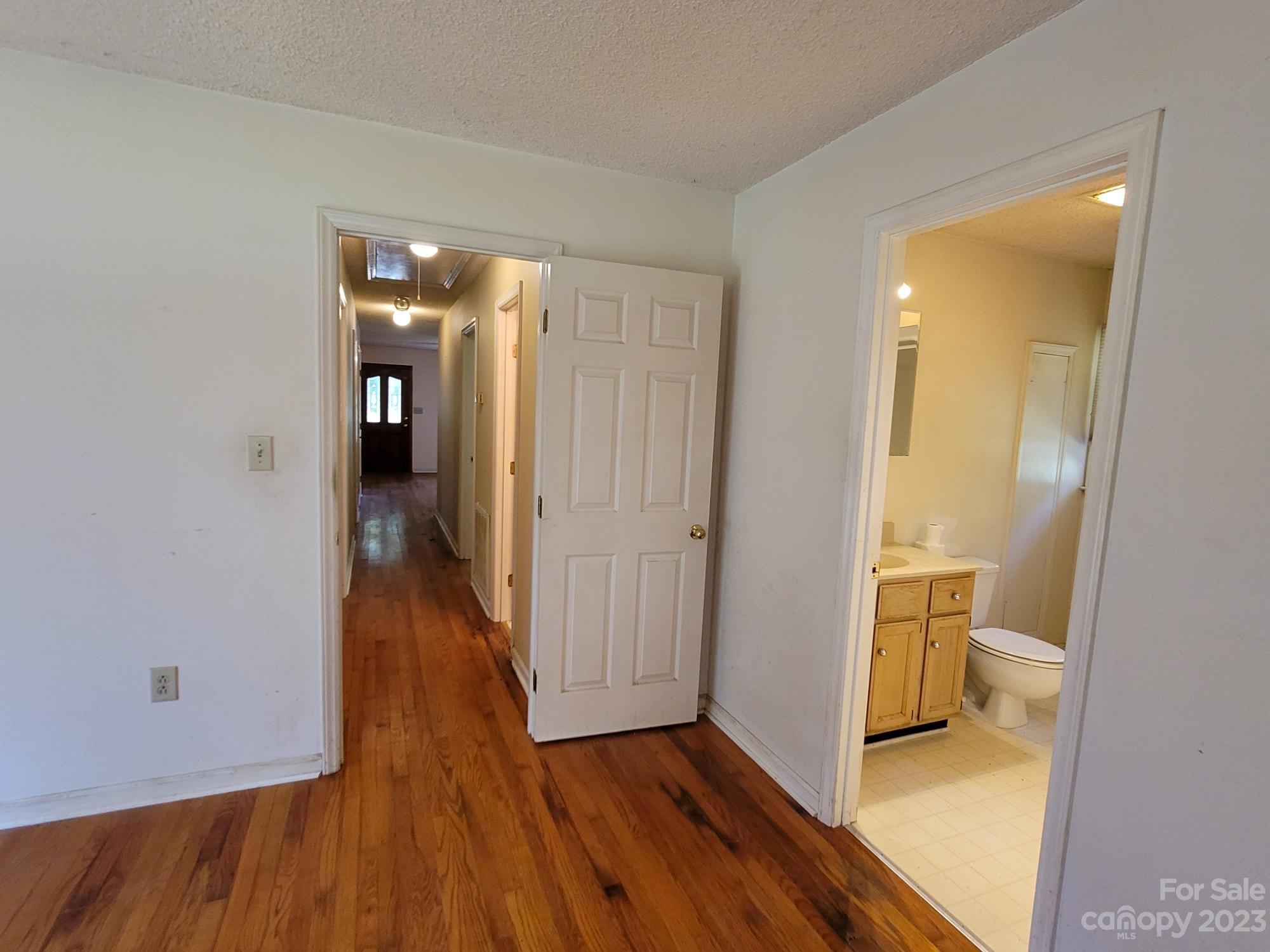 818 St Marks Church Road Bessemer City, NC 28016 - Photo 43 of 48 a view of a room with wooden floor