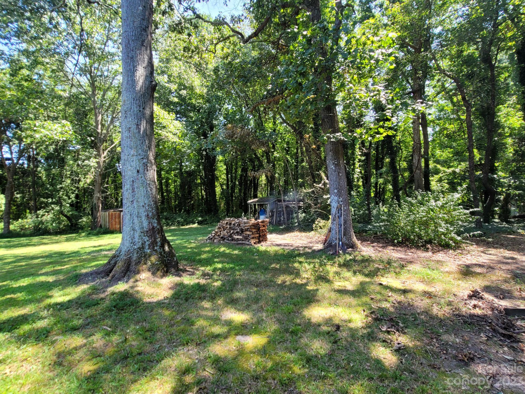 818 St Marks Church Road Bessemer City, NC 28016 - Photo 10 of 48 a view of a park with large trees