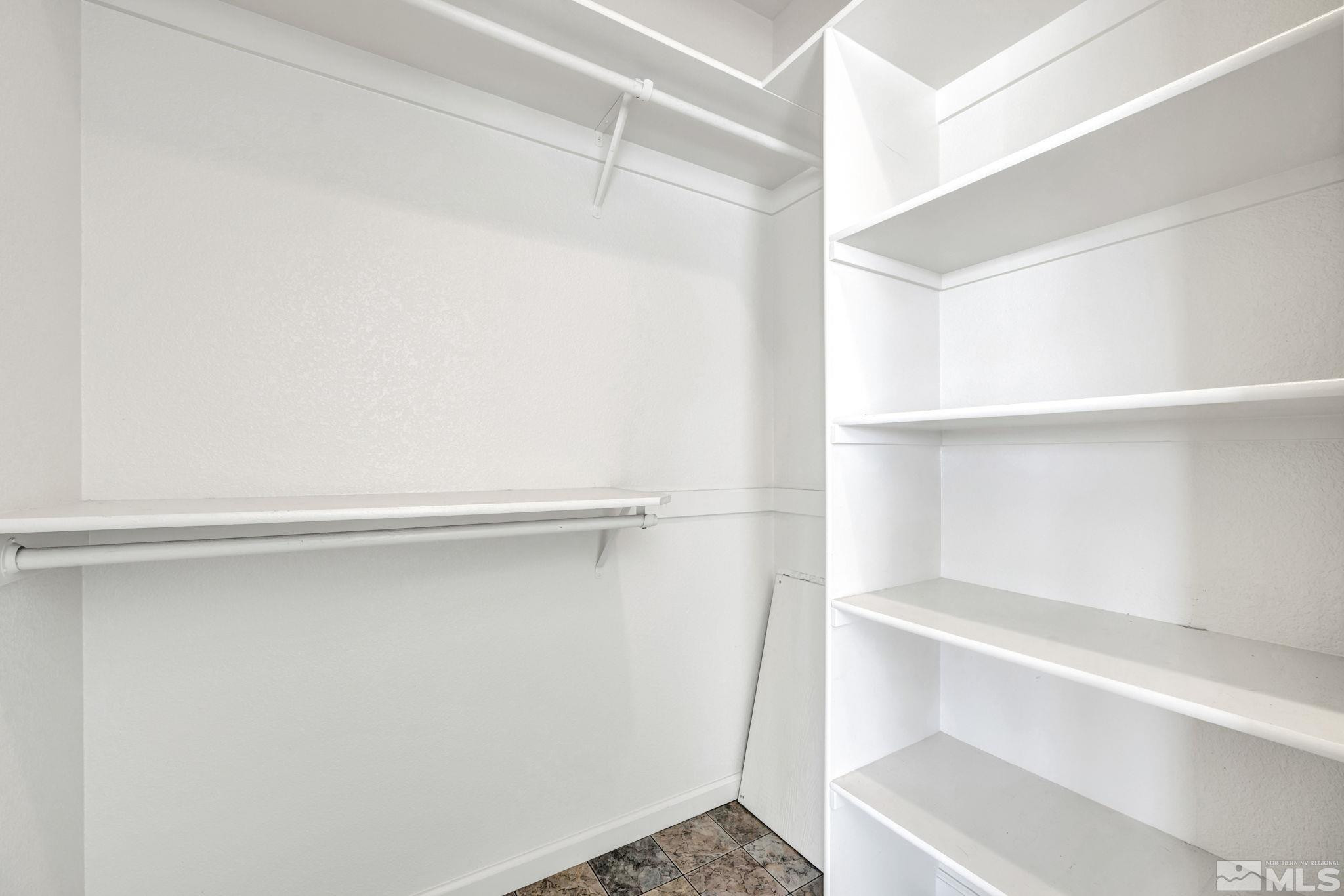 88 Smith Gage Road Smith, NV 89430 - Photo 14 of 40 a view of an empty walk in closet