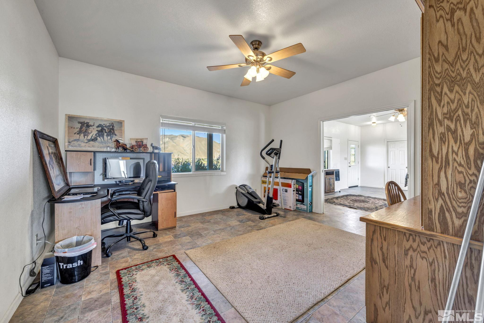 88 Smith Gage Road Smith, NV 89430 - Photo 19 of 40 a view of a workspace with furniture and a livingroom