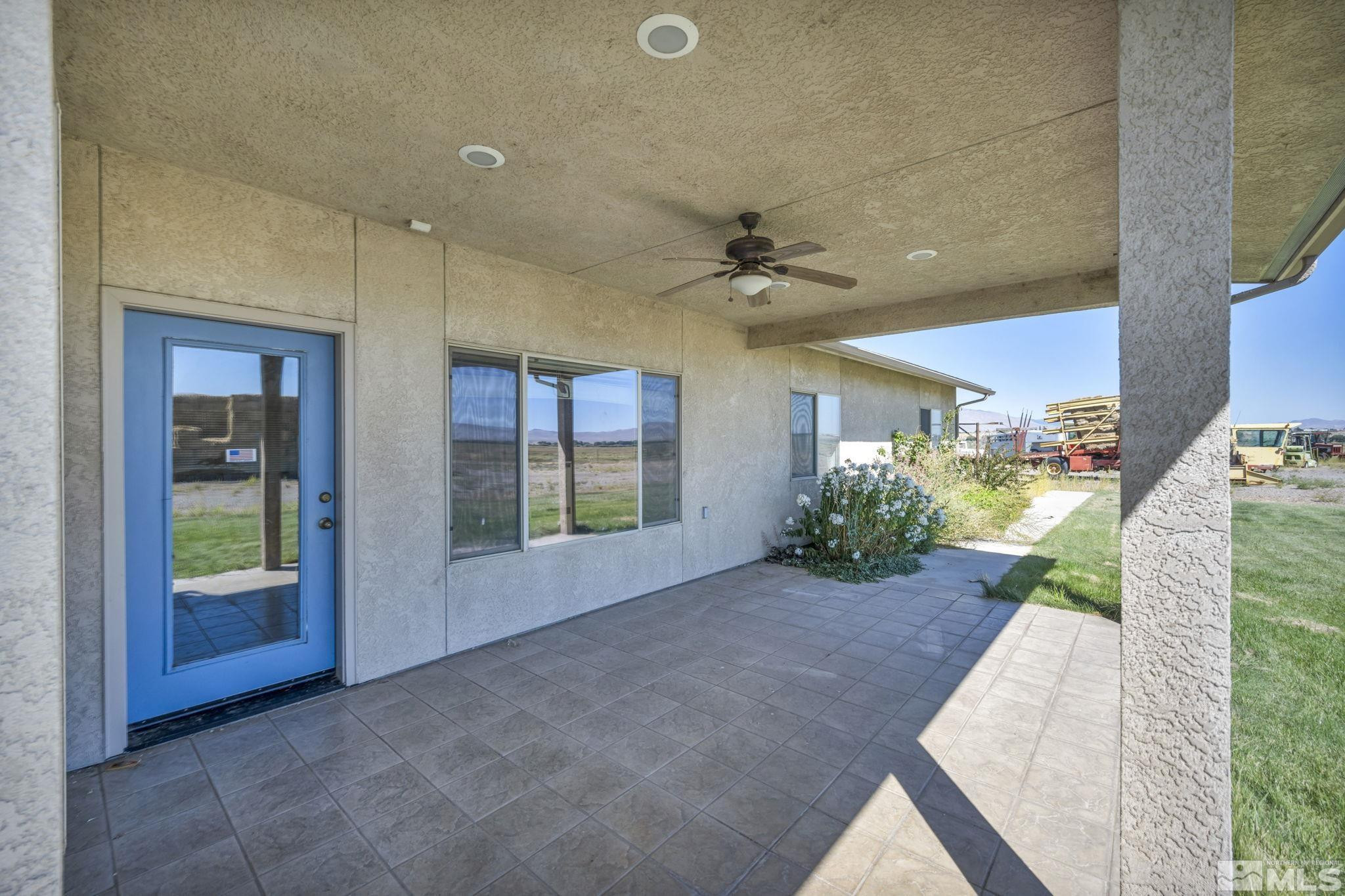 88 Smith Gage Road Smith, NV 89430 - Photo 23 of 40 a view of a porch with a table and chairs
