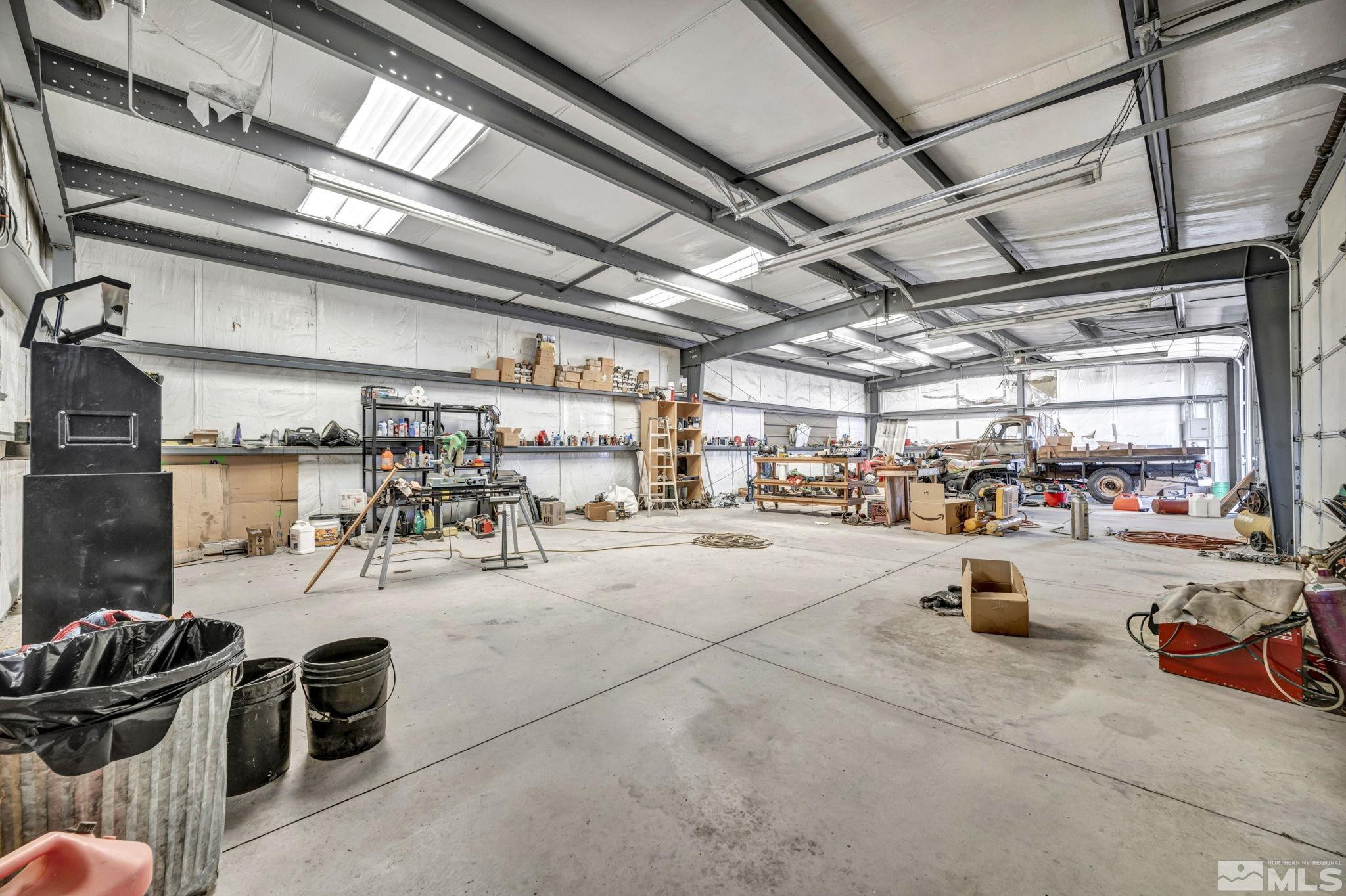 88 Smith Gage Road Smith, NV 89430 - Photo 25 of 40 a view of a garage with storage
