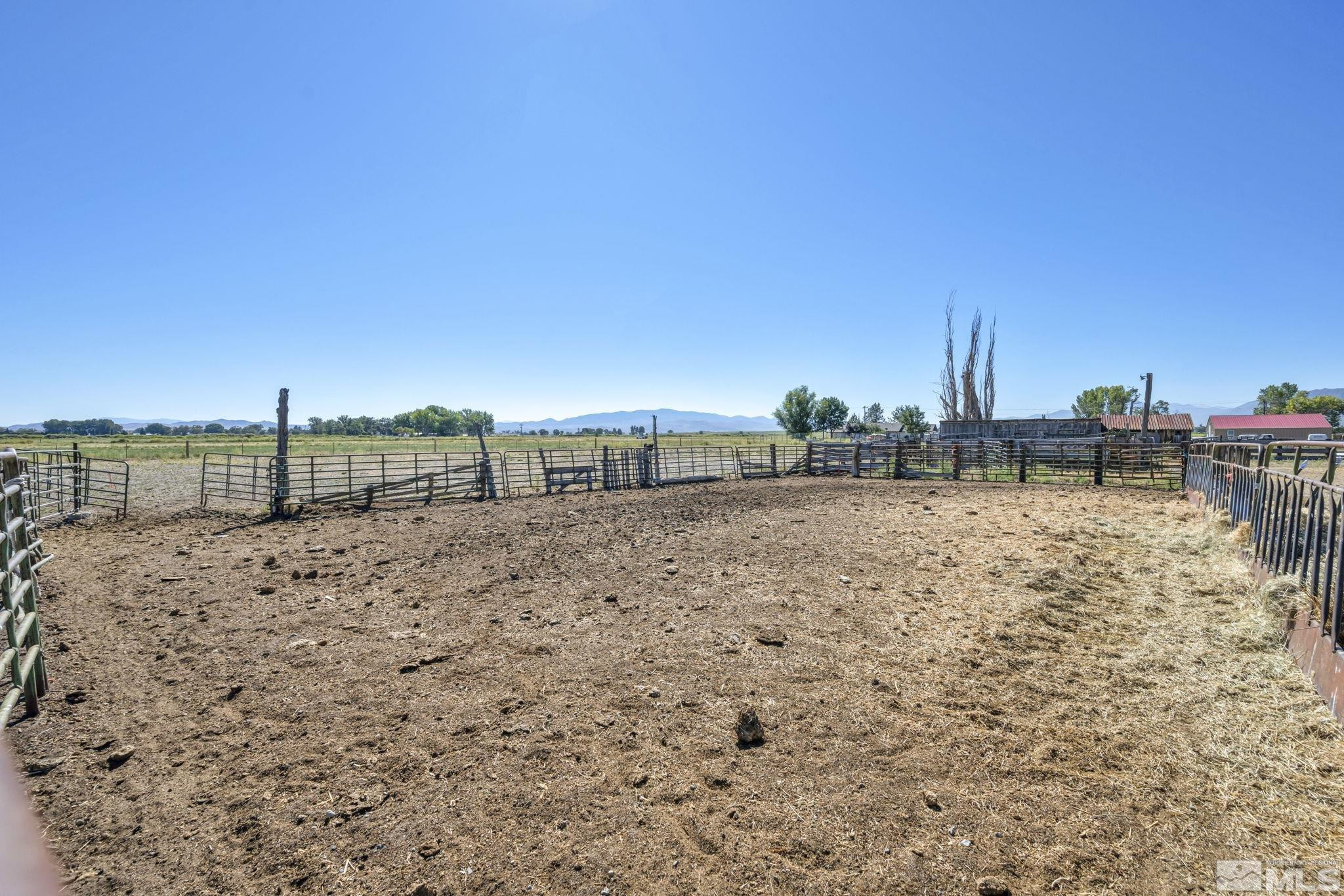 88 Smith Gage Road Smith, NV 89430 - Photo 33 of 40 a view of a dry yard with wooden fence