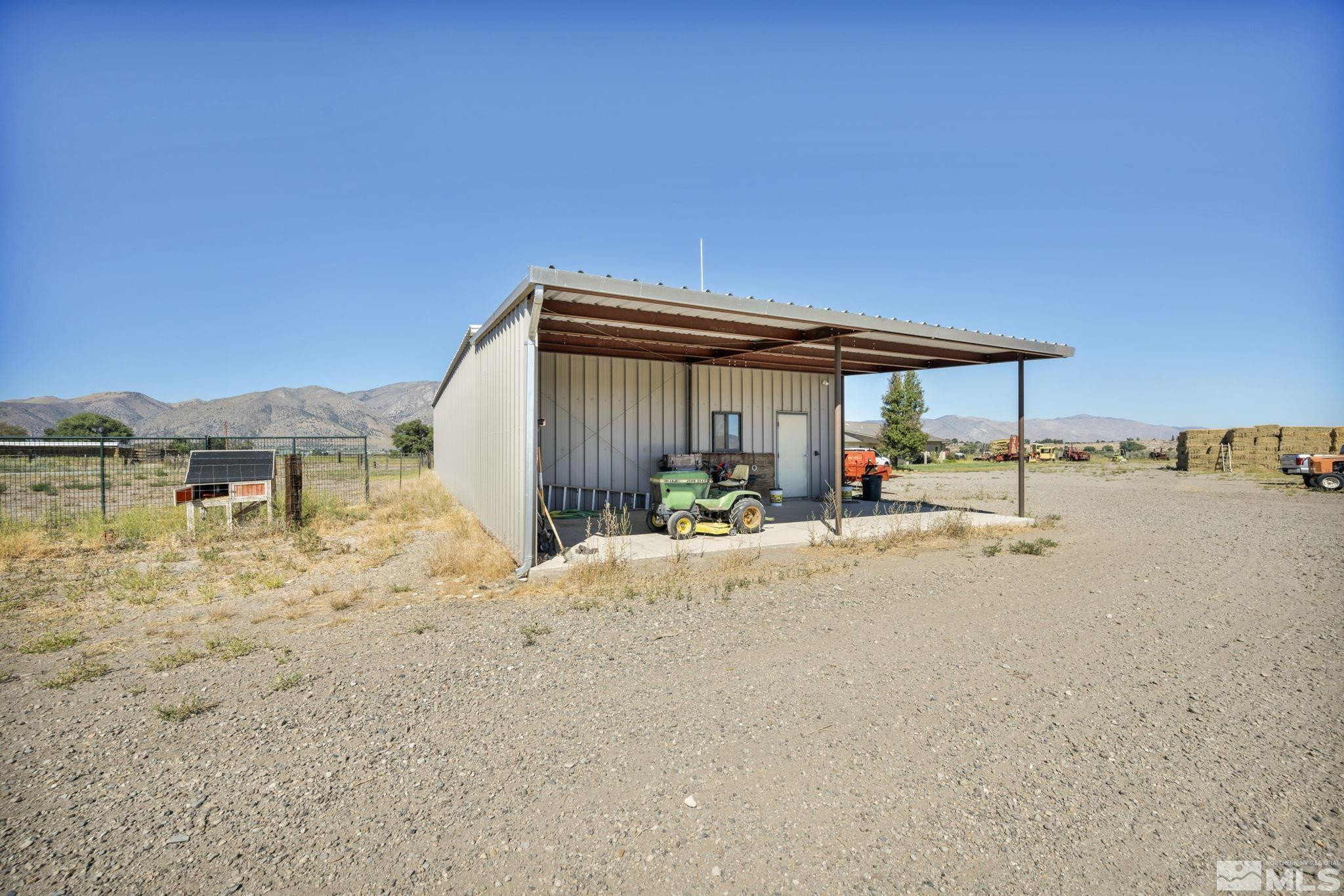 88 Smith Gage Road Smith, NV 89430 - Photo 34 of 40 a view of a house with backyard and sitting area