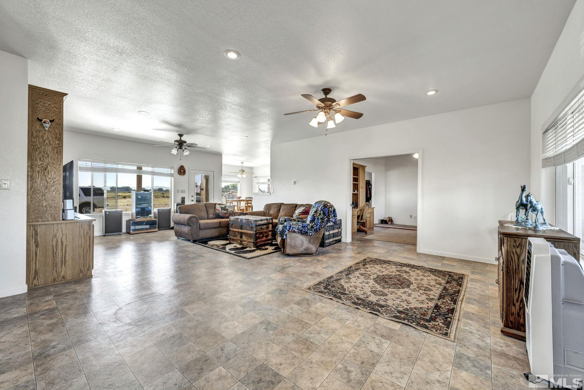 88 Smith Gage Road Smith, NV 89430 - Photo 6 of 40 a living room with lots of furniture and a view of living room