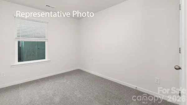 a view of a room that has a window in it