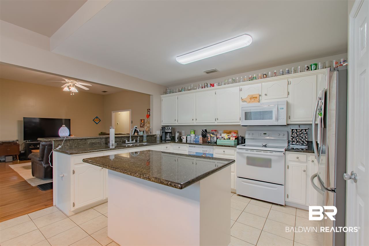 9211 Huckleberry Drive Daphne, AL 36527 - Photo 9 of 35 Kitchen Island