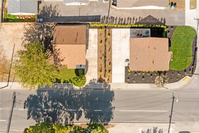 a living room with furniture a clock and a window