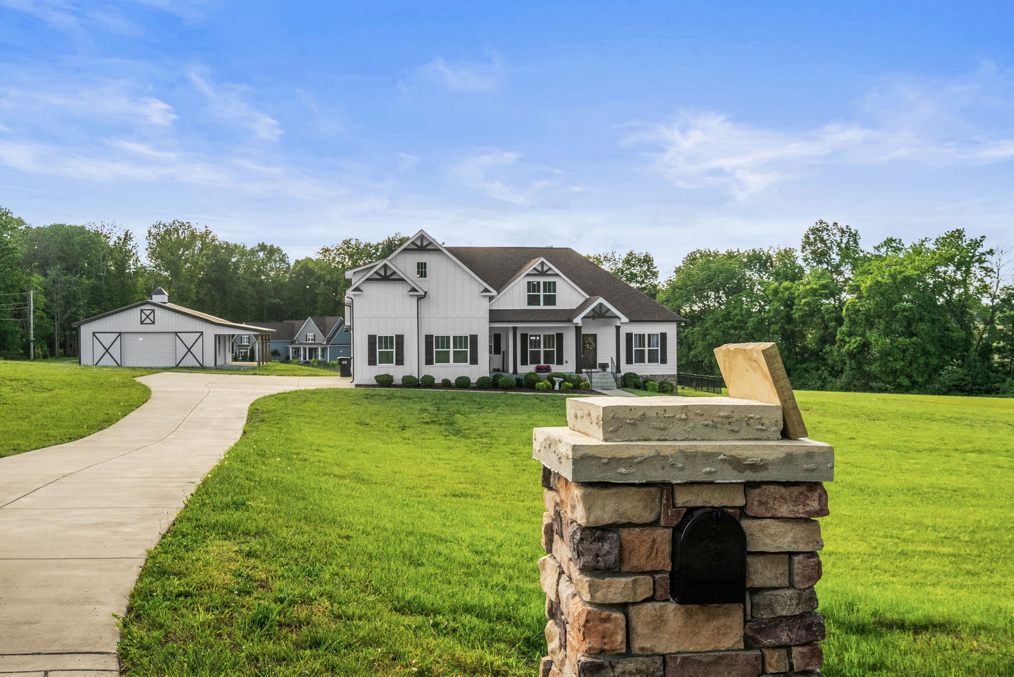 3378 New Hall Road Greenbrier, TN 37073 - Photo 10 of 83 a front view of a house with garden