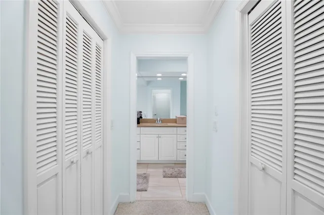 a bathroom with a shower and a sink