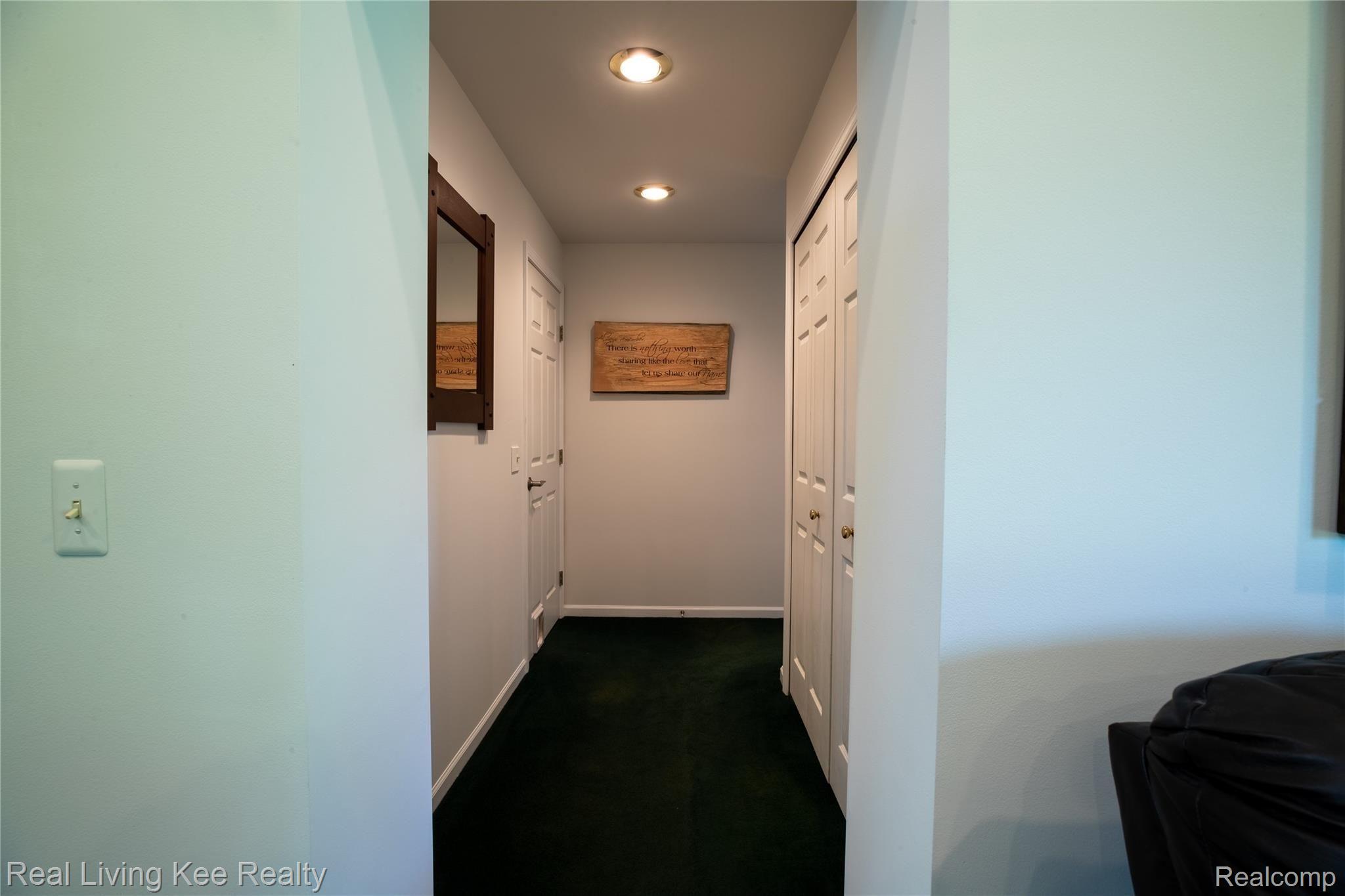 4230 Blood Road Metamora, MI 48455 - Photo 19 of 49 Hallway to master suite & laundry room