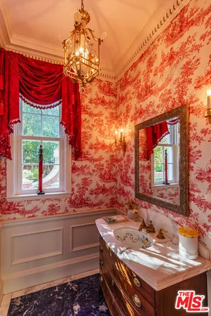 a view of entryway with a window and a chandelier