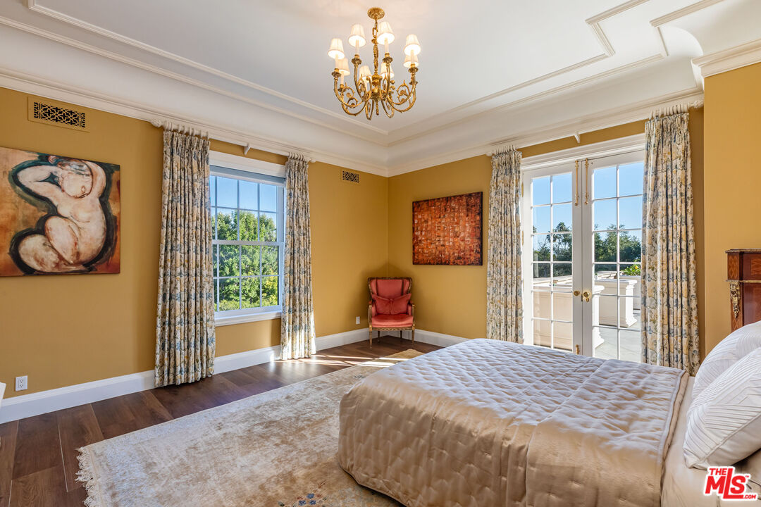 500 St Cloud Road Los Angeles, CA 90077 - Photo 26 of 59 a bedroom with a bed and a window