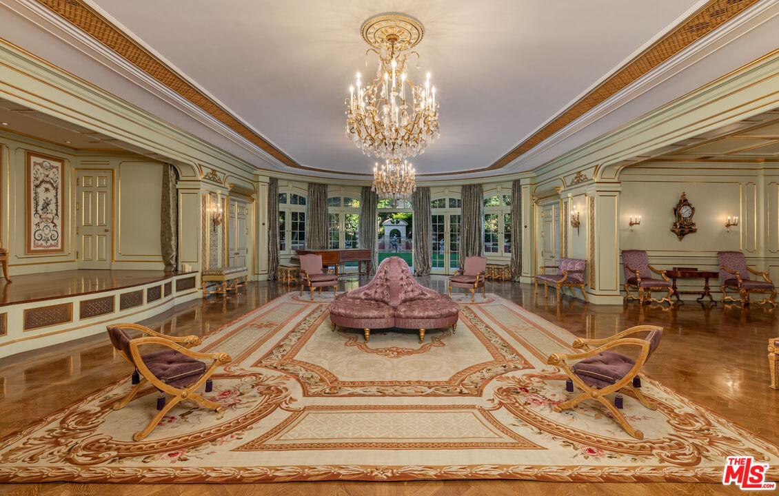 500 St Cloud Road Los Angeles, CA 90077 - Photo 30 of 59 a living room with furniture chandelier and a chandelier