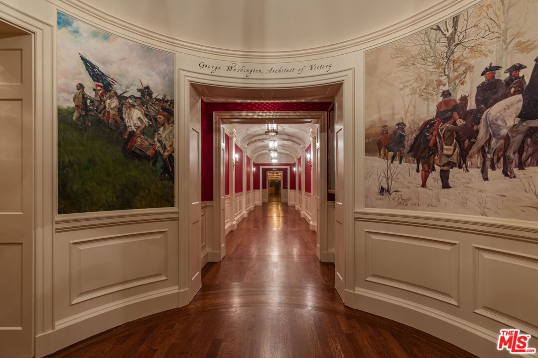 500 St Cloud Road Los Angeles, CA 90077 - Photo 36 of 59 a view of a hallway with wooden floor and windows