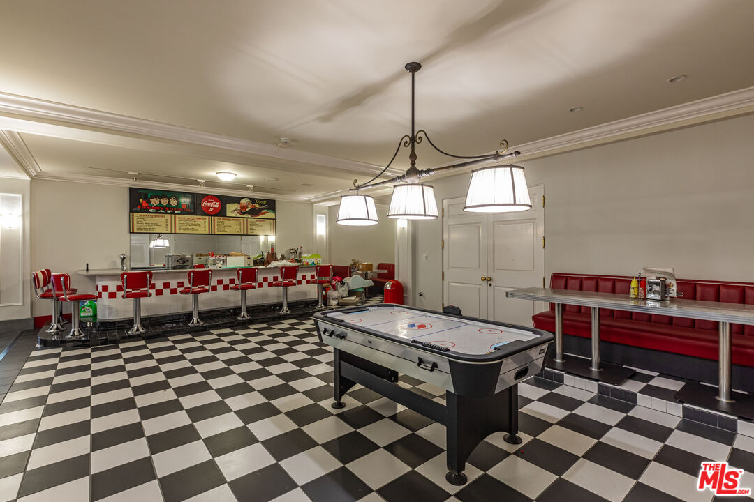 500 St Cloud Road Los Angeles, CA 90077 - Photo 38 of 59 a room with lots of furniture and window