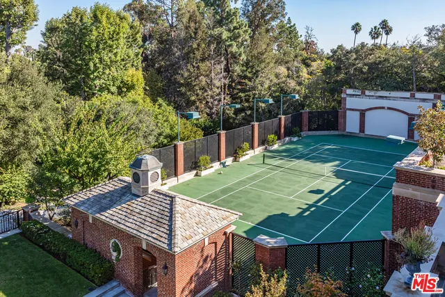 a view of a fountain in the garden