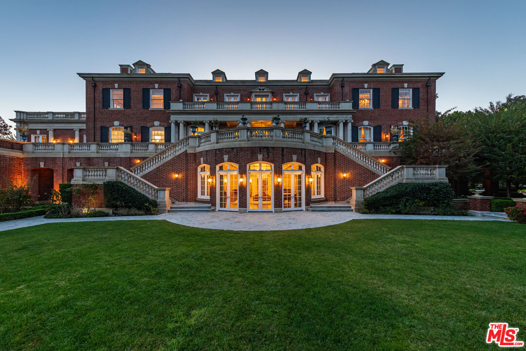 500 St Cloud Road Los Angeles, CA 90077 - Photo 55 of 59 a view of a big building with big yard and large trees