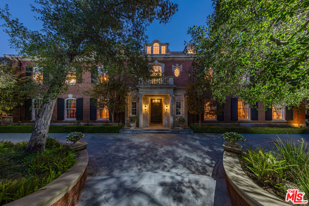 500 St Cloud Road Los Angeles, CA 90077 - Photo 59 of 59 a front view of a house with garden