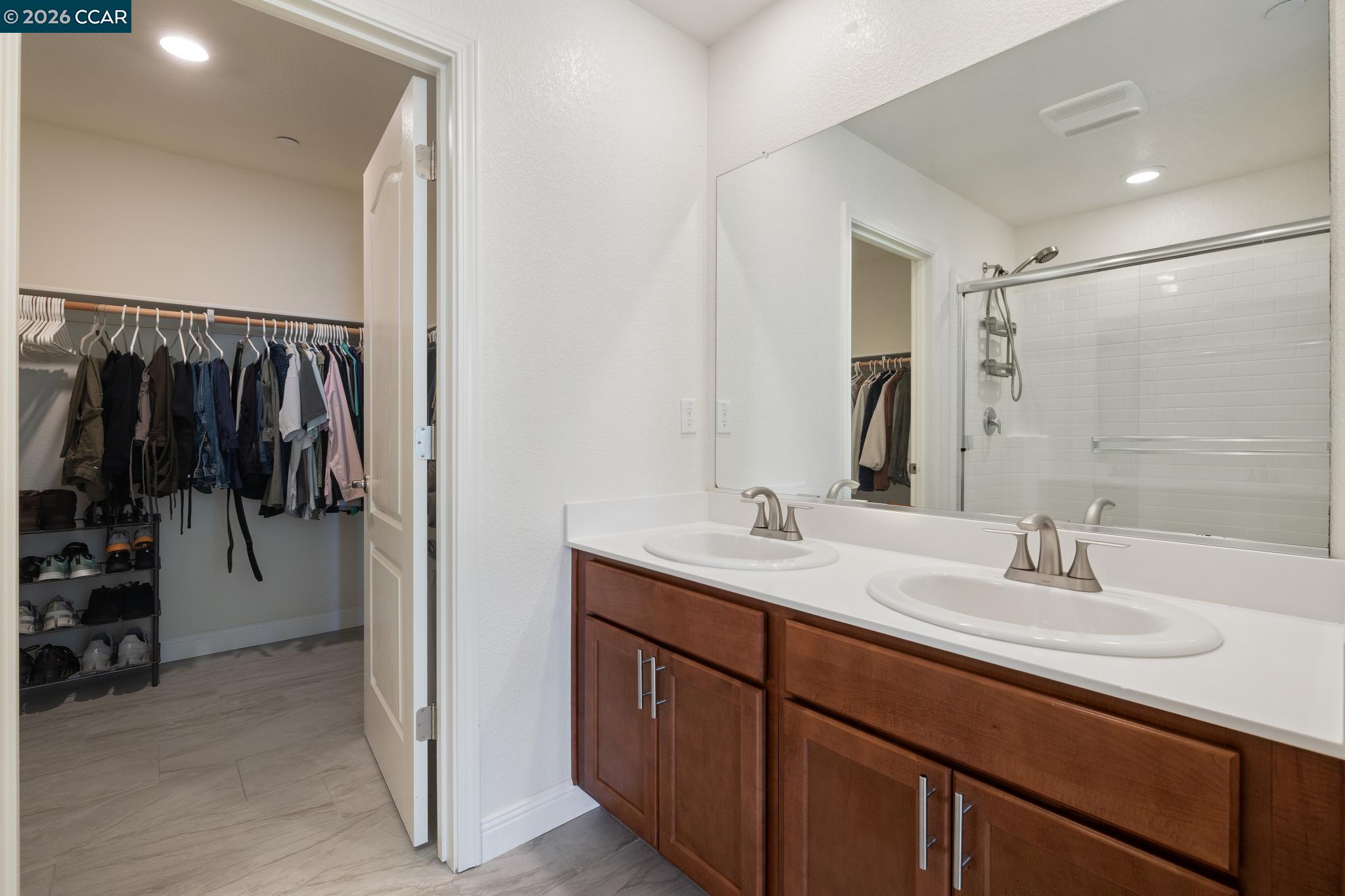 4748 Beacon Way Rio Vista, CA 94571 - Photo 18 of 35 a en suite bathroom with a sink and a mirror
