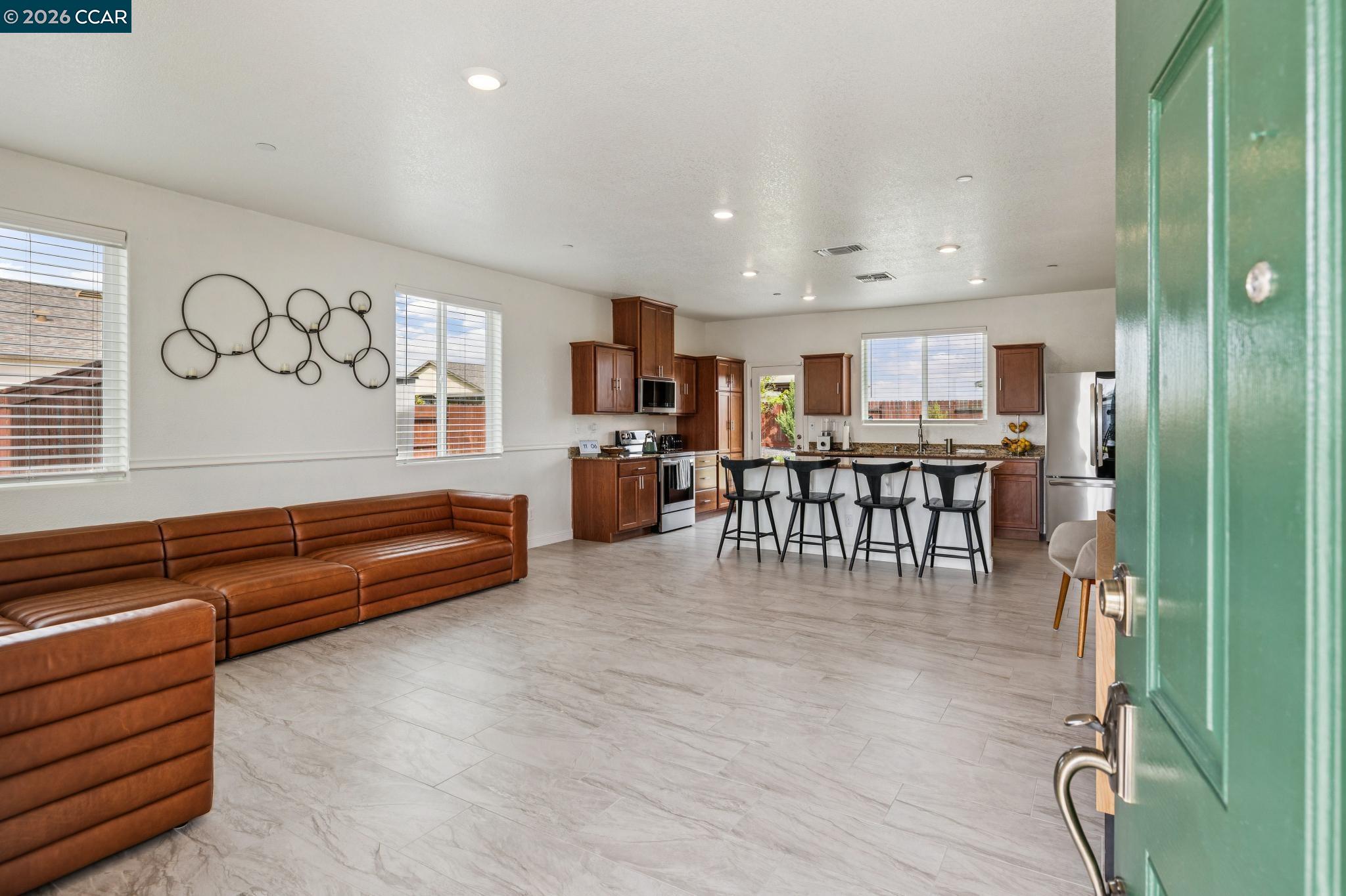 4748 Beacon Way Rio Vista, CA 94571 - Photo 2 of 35 a living room with furniture and kitchen view