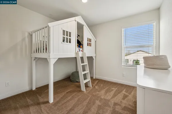 a room with furniture and window