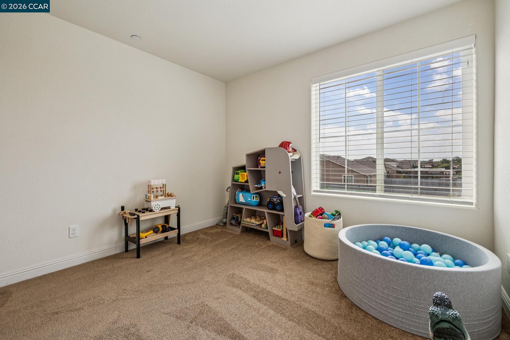 4748 Beacon Way Rio Vista, CA 94571 - Photo 25 of 35 a living room with furniture and a potted plant