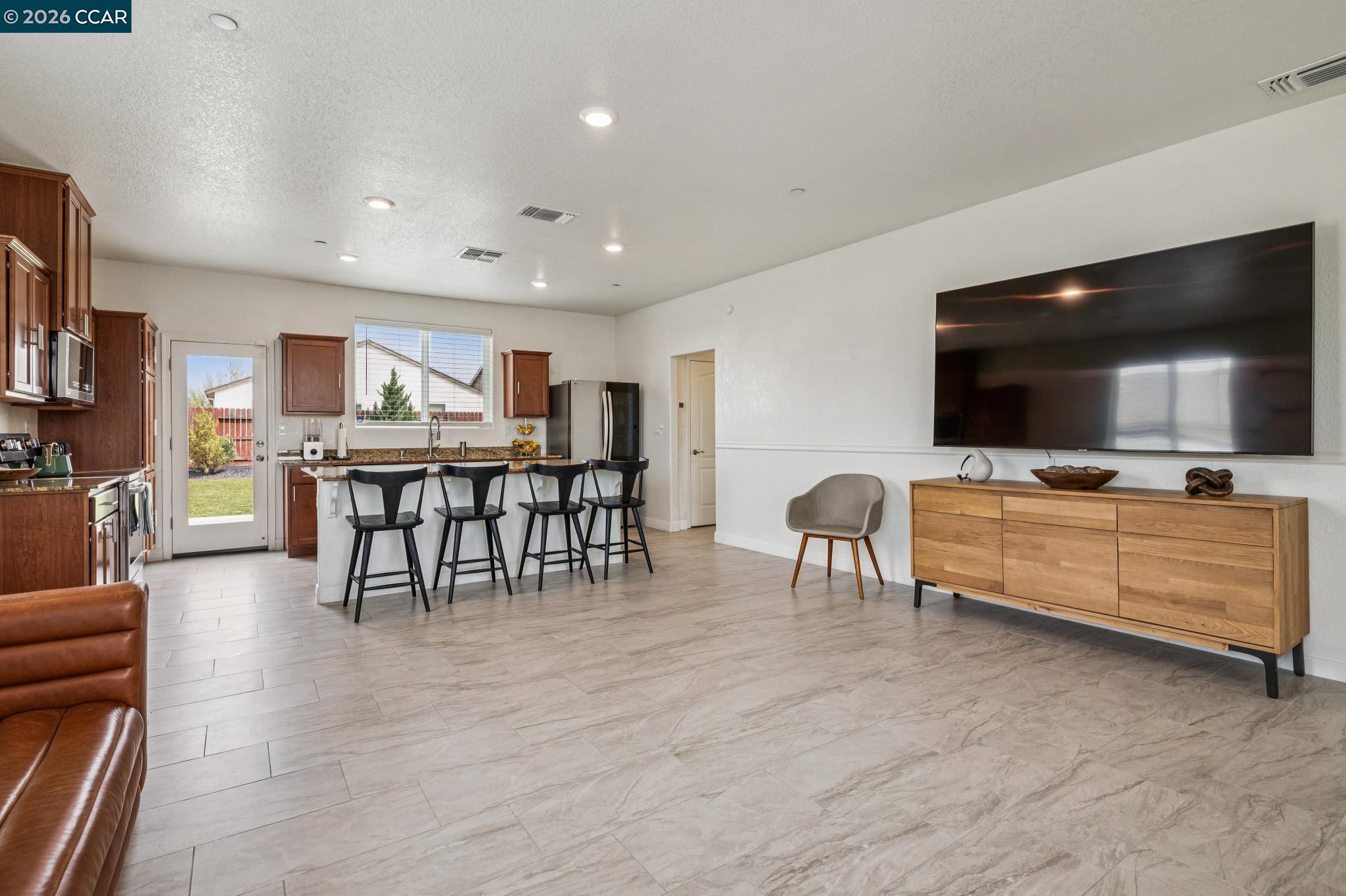 4748 Beacon Way Rio Vista, CA 94571 - Photo 6 of 35 a living room with furniture and a flat screen tv