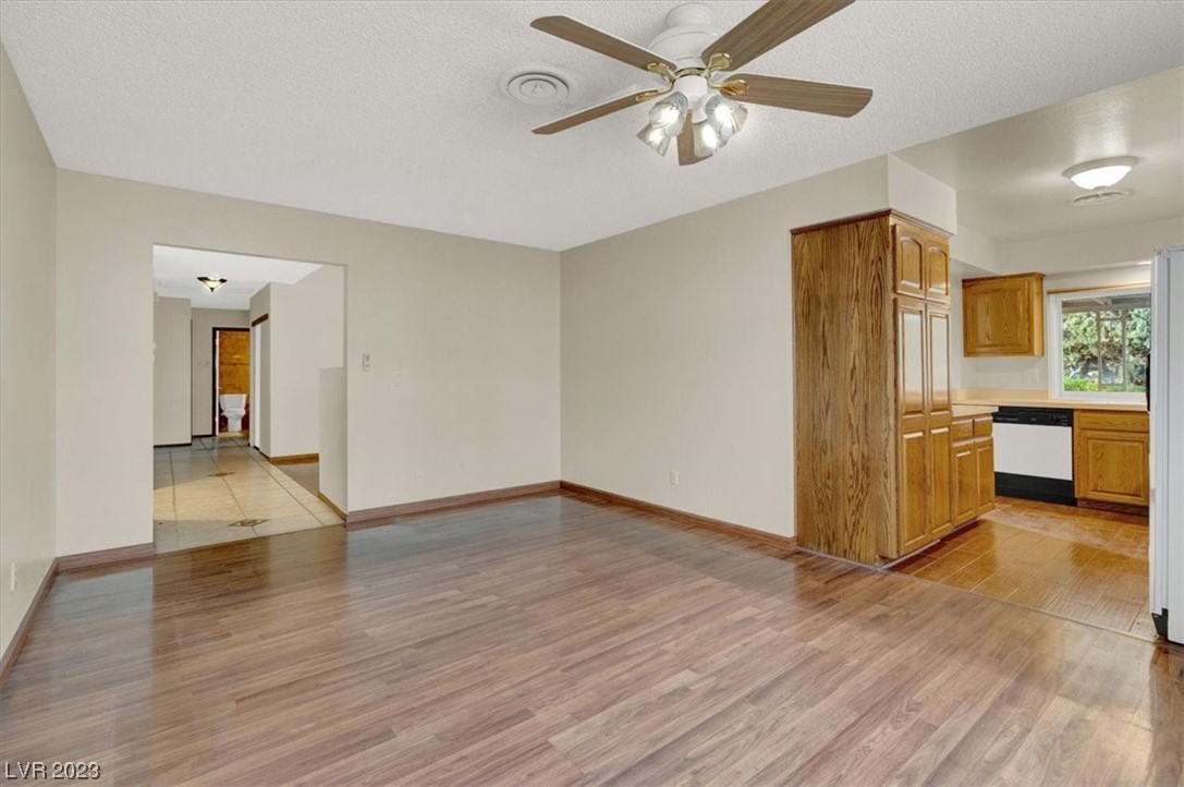 1407 Bronco Road Boulder City, NV 89005 - Photo 12 of 38 Formal dining room looking towards entry and bedro