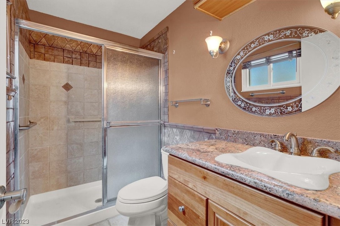1407 Bronco Road Boulder City, NV 89005 - Photo 20 of 38 Primary bath features custom tile finishes